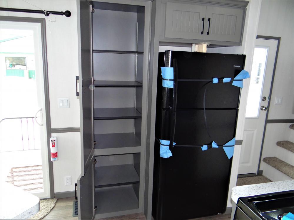 Pantry with Adjustable Shelves & Full Depth Cabinet over Refrigerator 