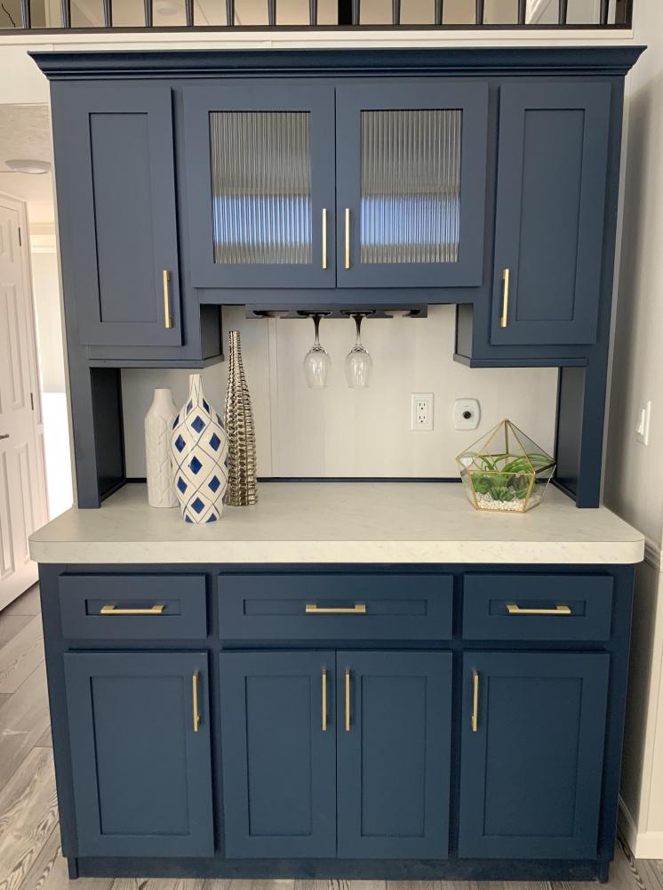 Navy Cabinet on Hutch with Standard Glass Inserts in Center Cabinet & Optional Upgrade Gold Handles with White Carrara Counters