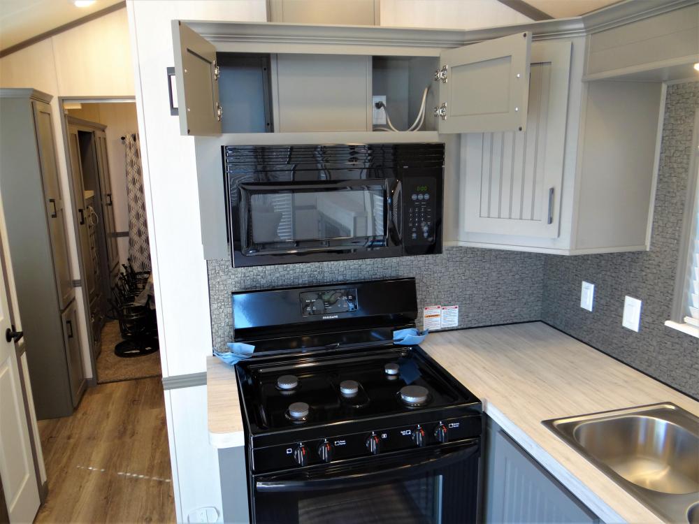 Full Depth Cabinets, Vented Range & Microwave (all standard)