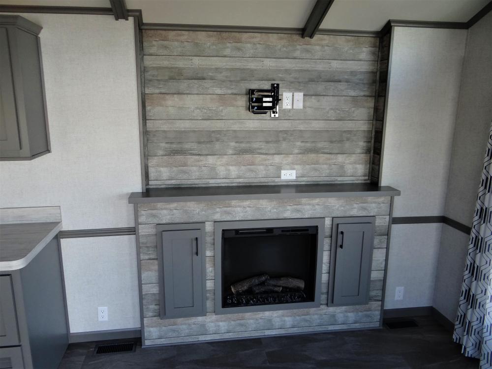 Recessed Entertainment with Mantle & Knotted Oak Accent Wall. Added TV Bracket & Fireplace