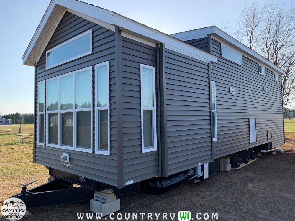 Unit Shown on Site after Delivery & Set Up Note: Additional Dormer Added Over Kitchen