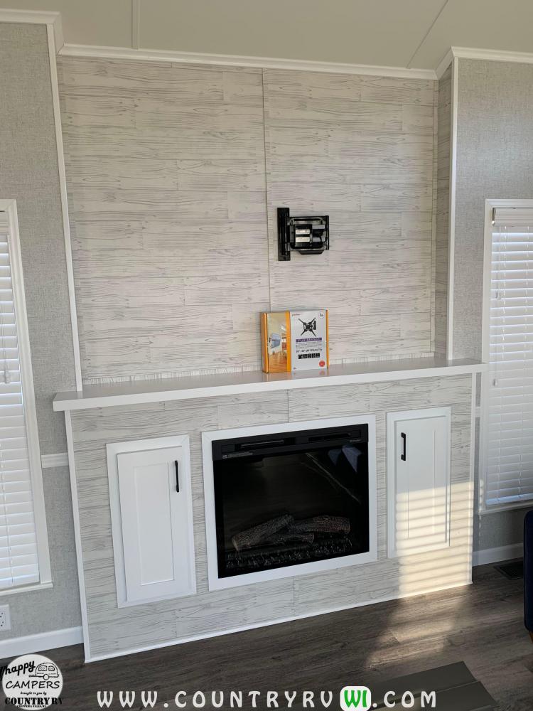 Recessed Entertainment with Accent Wall in Noah Cream. Optional Mantle Top, TV Bracket & Fireplace