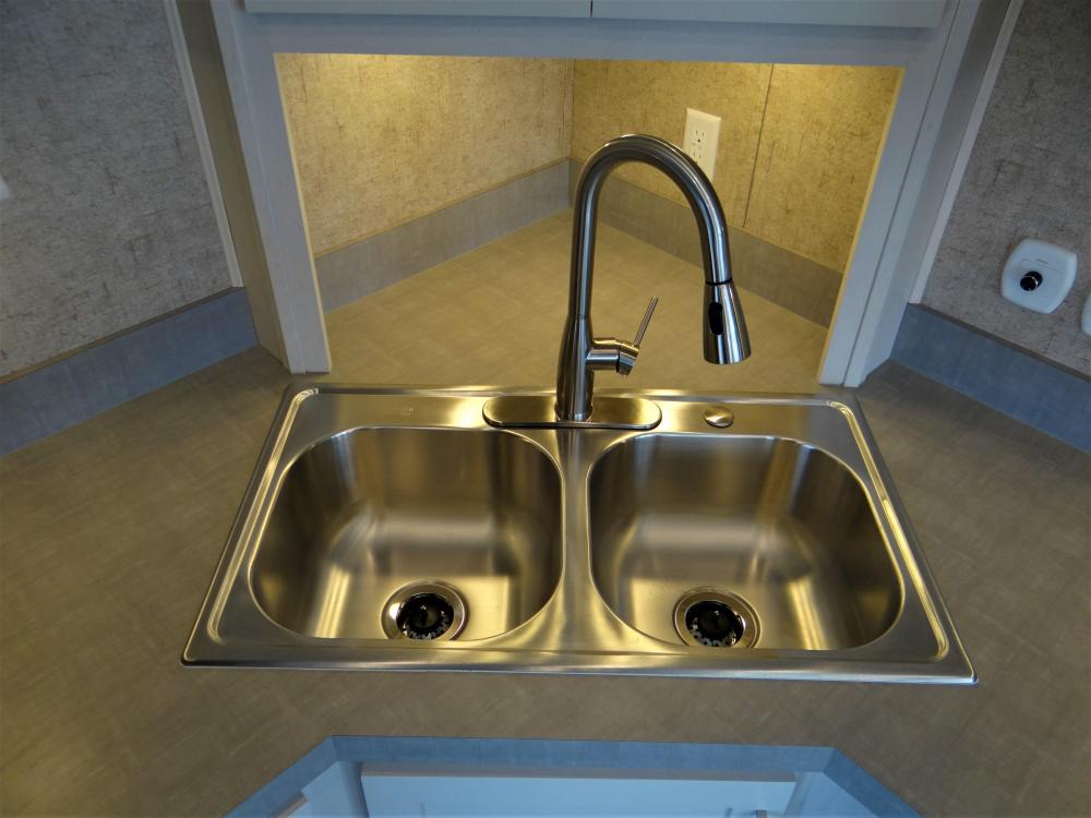 Stainless Steel Double Sink & Nickle Faucet