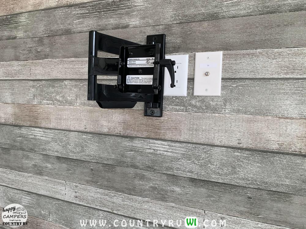 Full motion TV bracket with TV wire chase