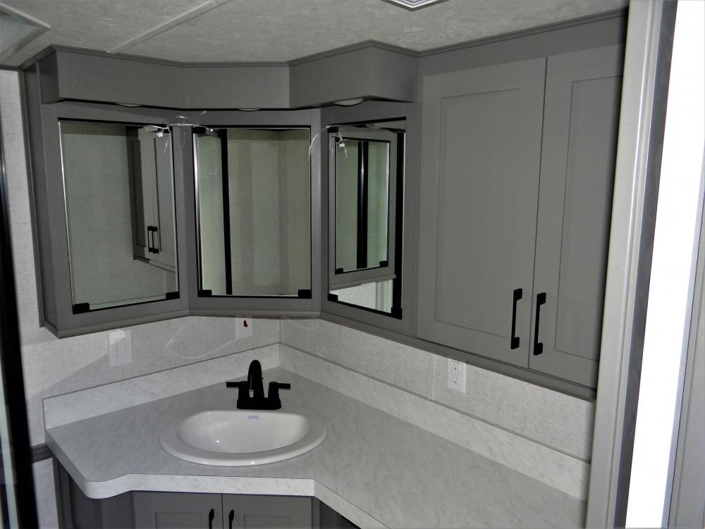 Corner Medicine Cabinet, Porcelain Sink & Single Lever Faucet (all standard)