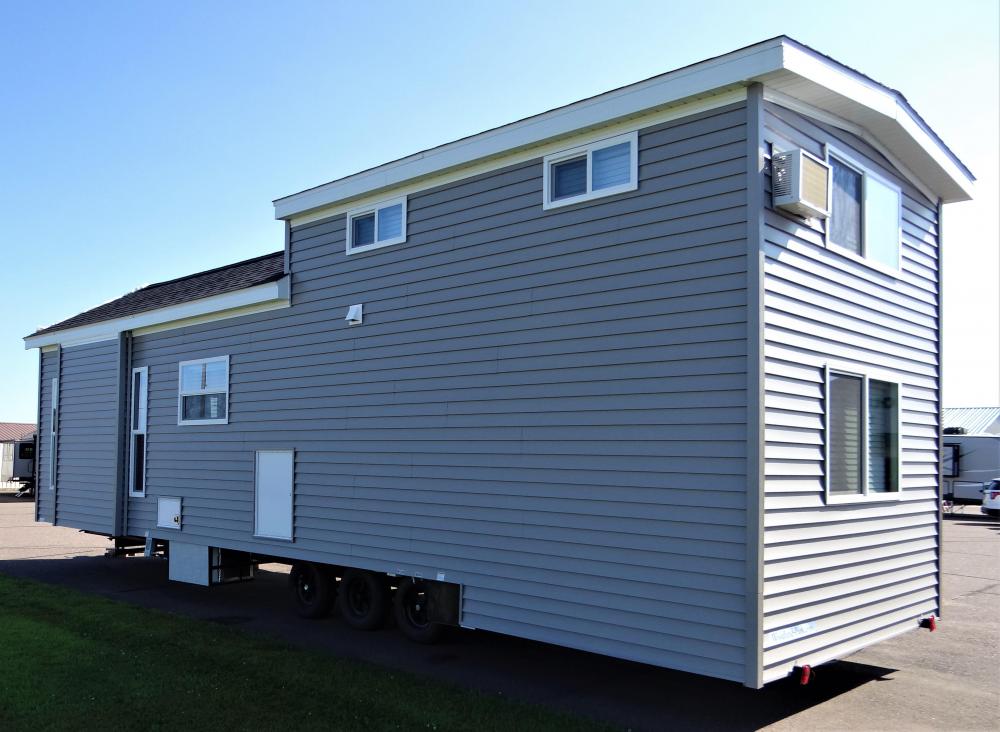 Exterior in Harvard Slate Vinyl Siding & Dual Black Shingles