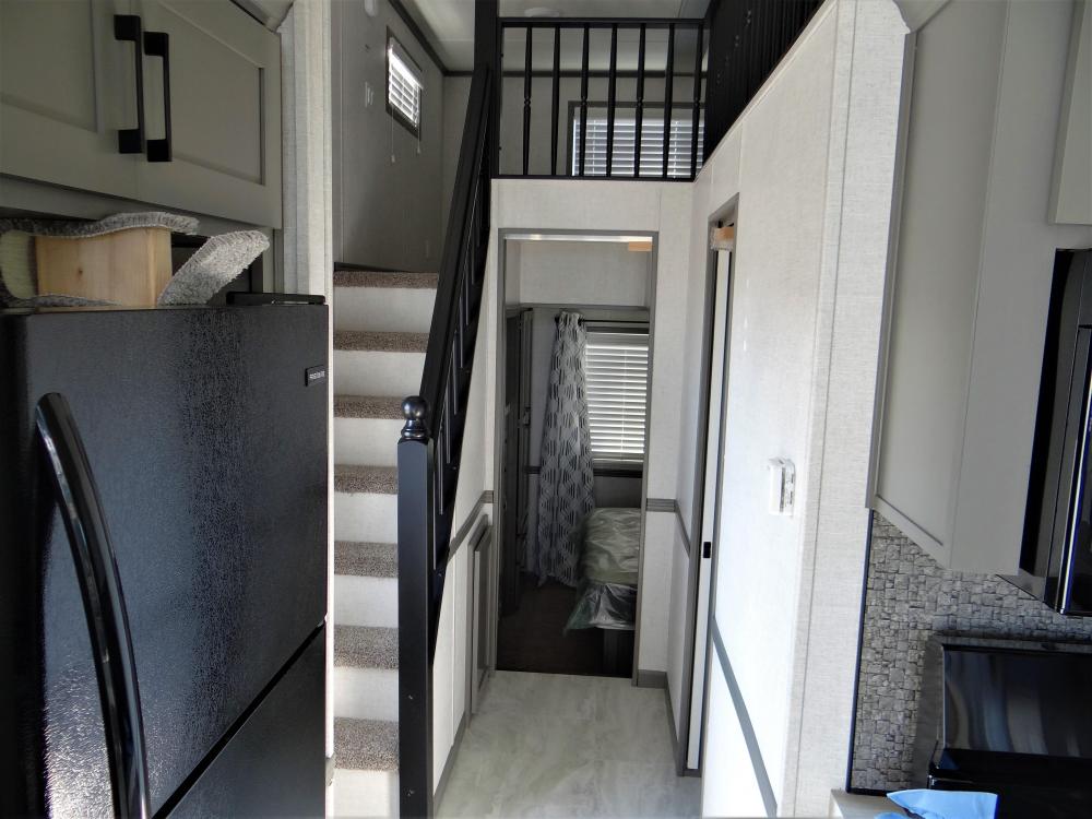 Open Hallway (no ceiling) Front Loft Cut Back over Bathroom Only