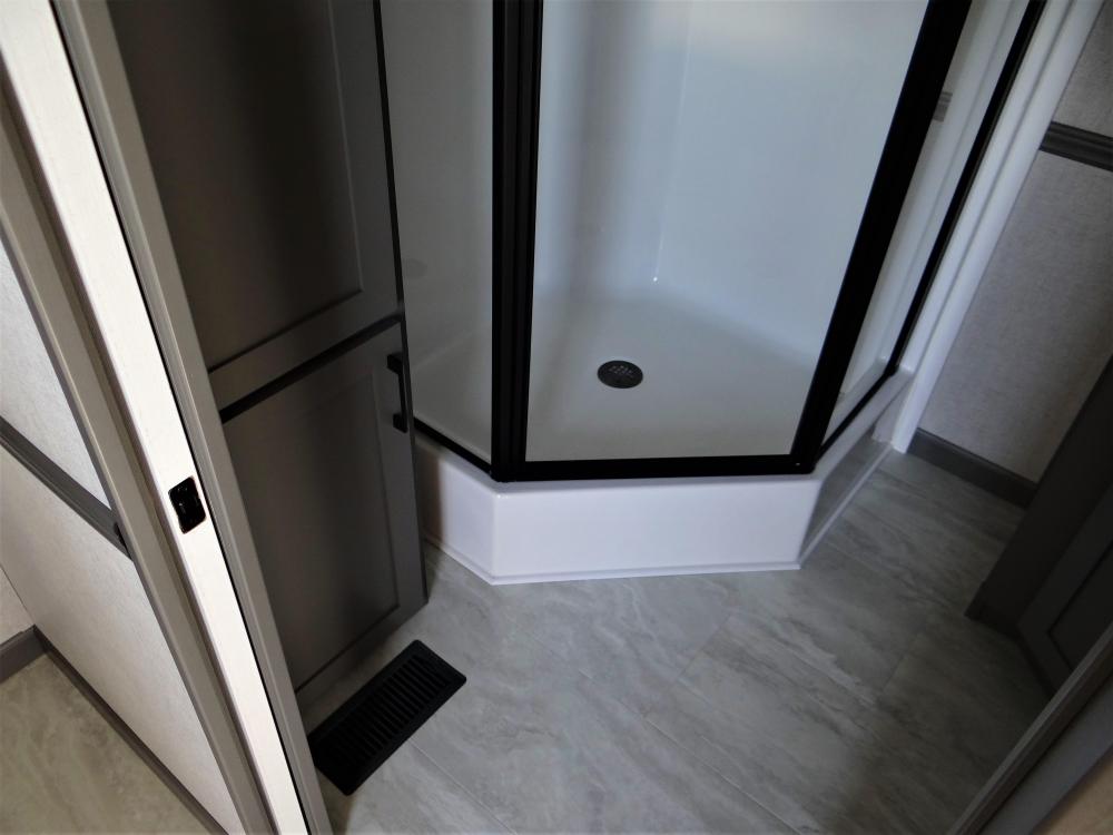 Corner Shower with Glass Door & Linen Cabinet